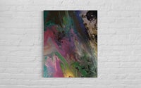 an abstract painting hanging on a brick wall