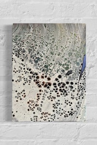 a black and white photo of a brick wall