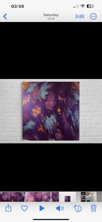 a screen shot of an iphone with a purple painting on it